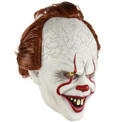 Scary pennywise clown mask with red hair on a white background